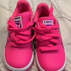Pink and metallic purple puma sneakers